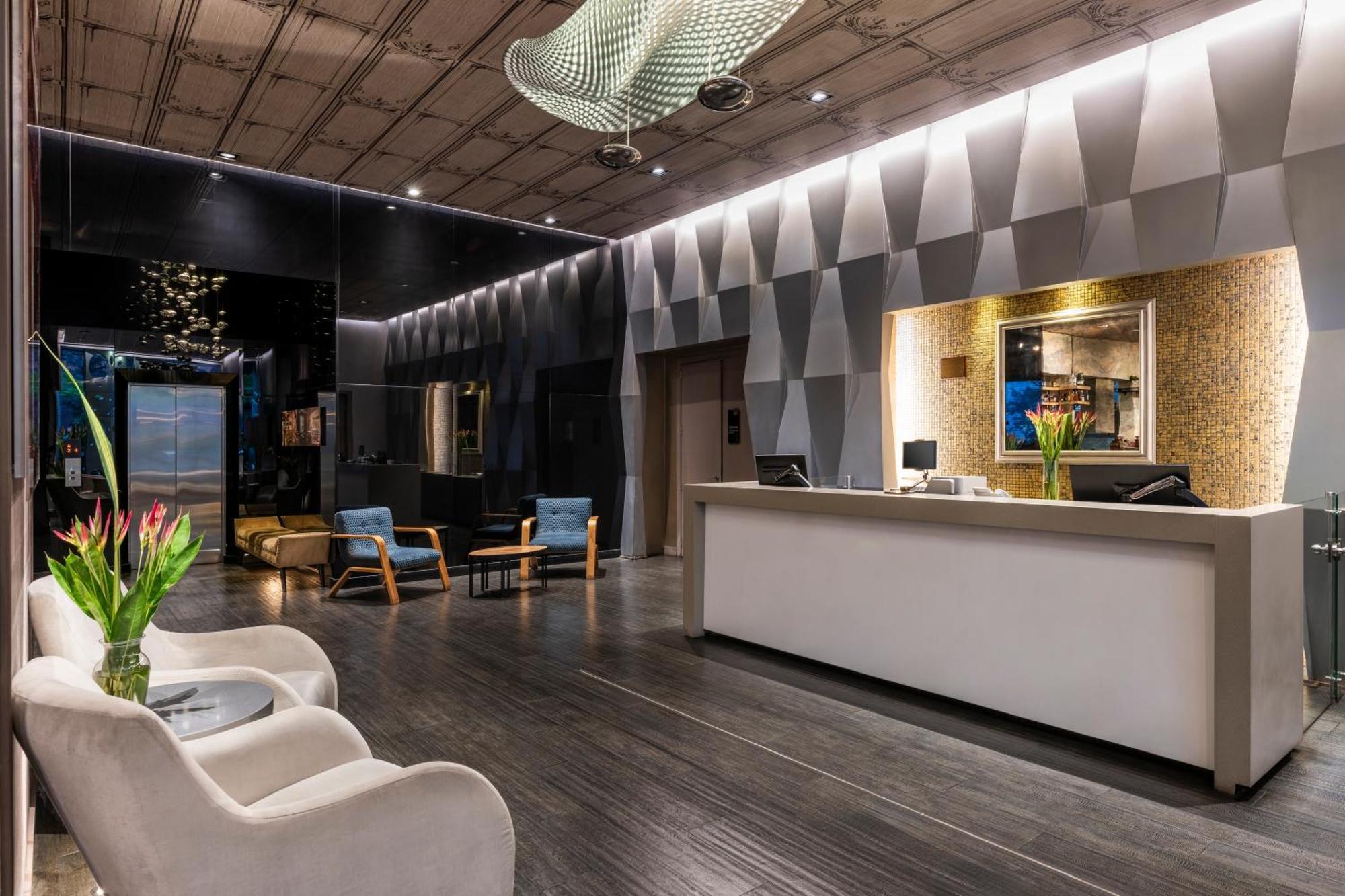 Hotel 100 Luxury Suites By Preferred Bogota Buitenkant foto The lobby of the hotel