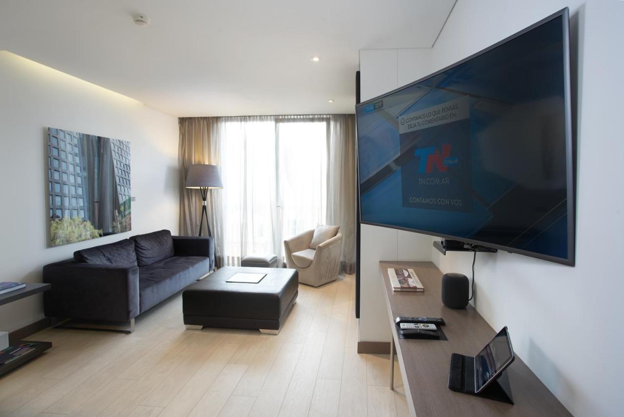Hotel 100 Luxury Suites By Preferred Bogota Buitenkant foto A television set in a hotel room